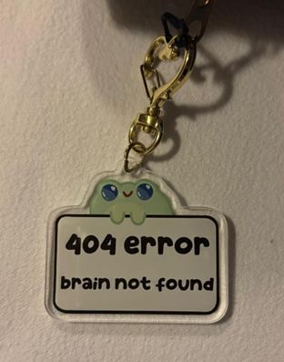 Picture of a keychain I bought from an independent artist at the Art Department